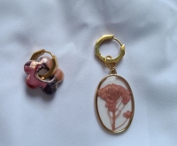 Bedel oorbellen oud roze