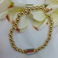 Elastische armband met statement kraal